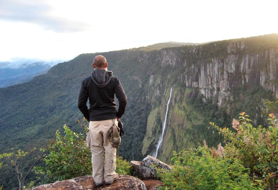 Tourist looking at the mountain in Nyanga National Park, a tourist destination in Zimbabwe